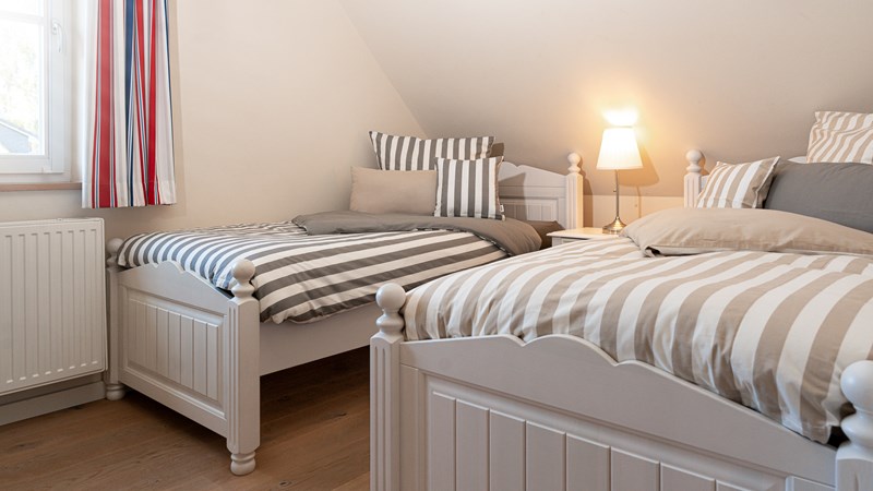 Ferien im Duenenhaus Lasse und Ole Insel Rügen Glowe Schlafzimmer